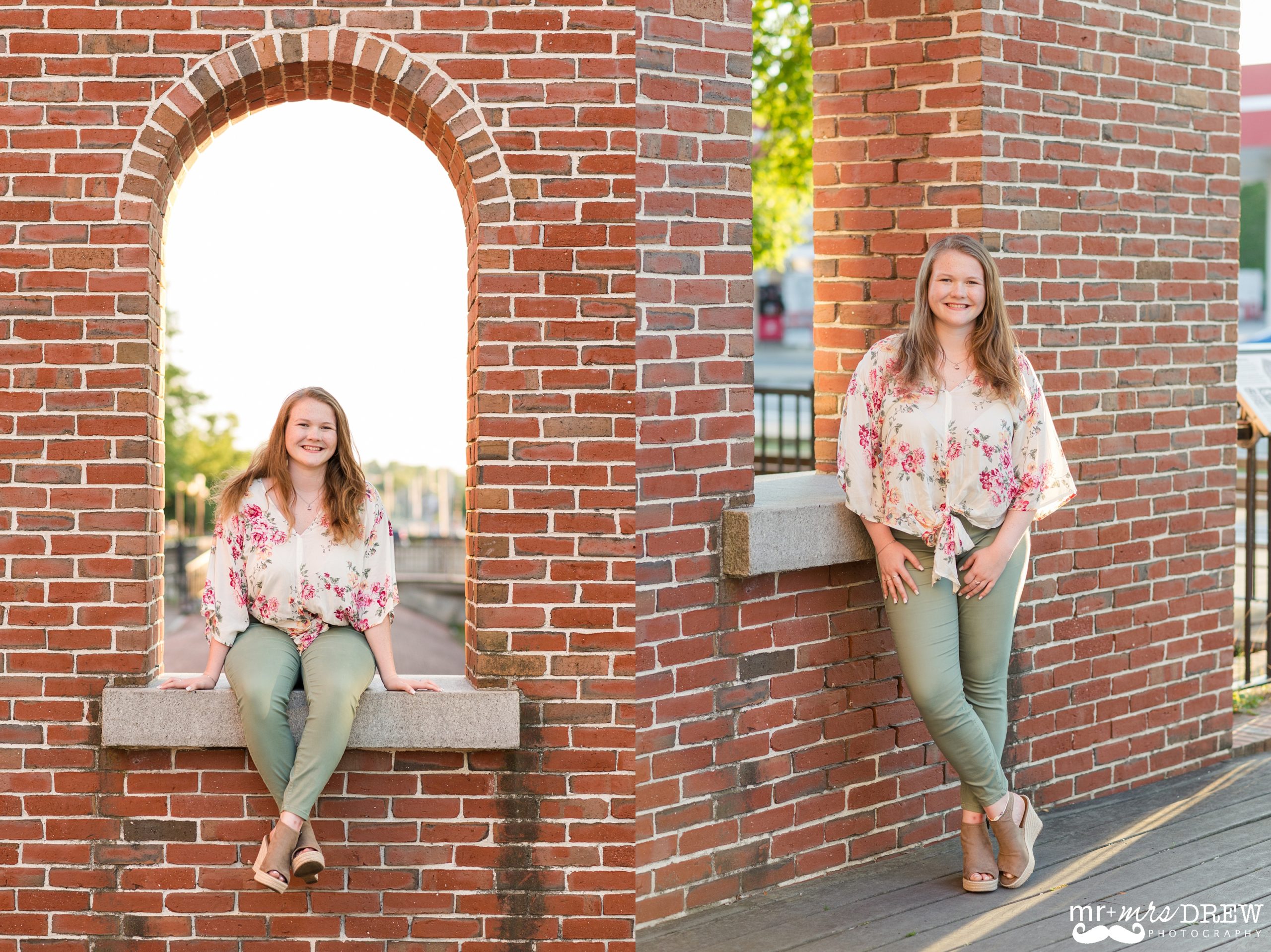 Senior Portraits Downtown Lowell - Meredyth is posing in front of a brick wall smiling.