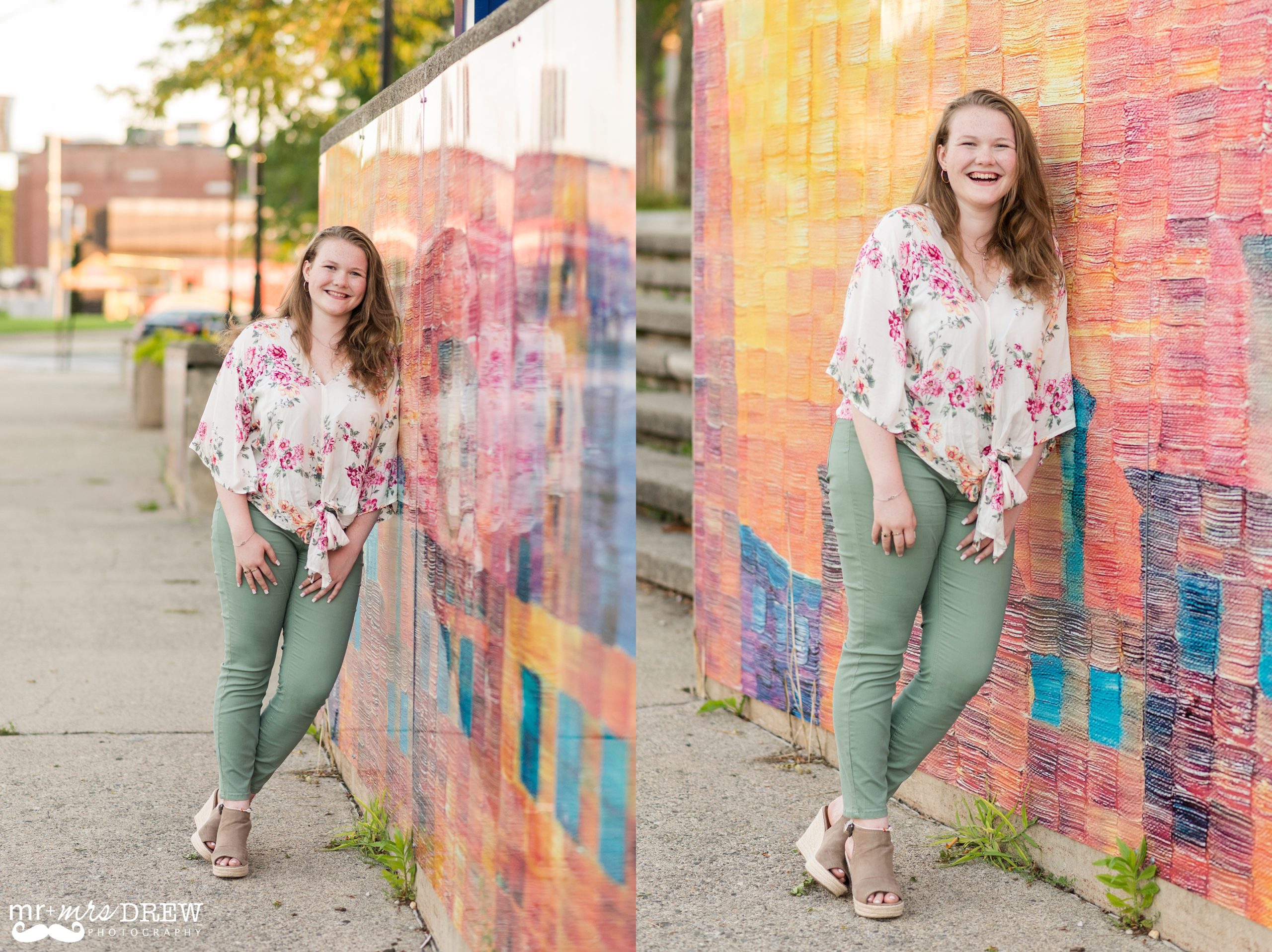 Senior Portraits Downtown Lowell - Meredyth is laughing in front of a colorful wall.