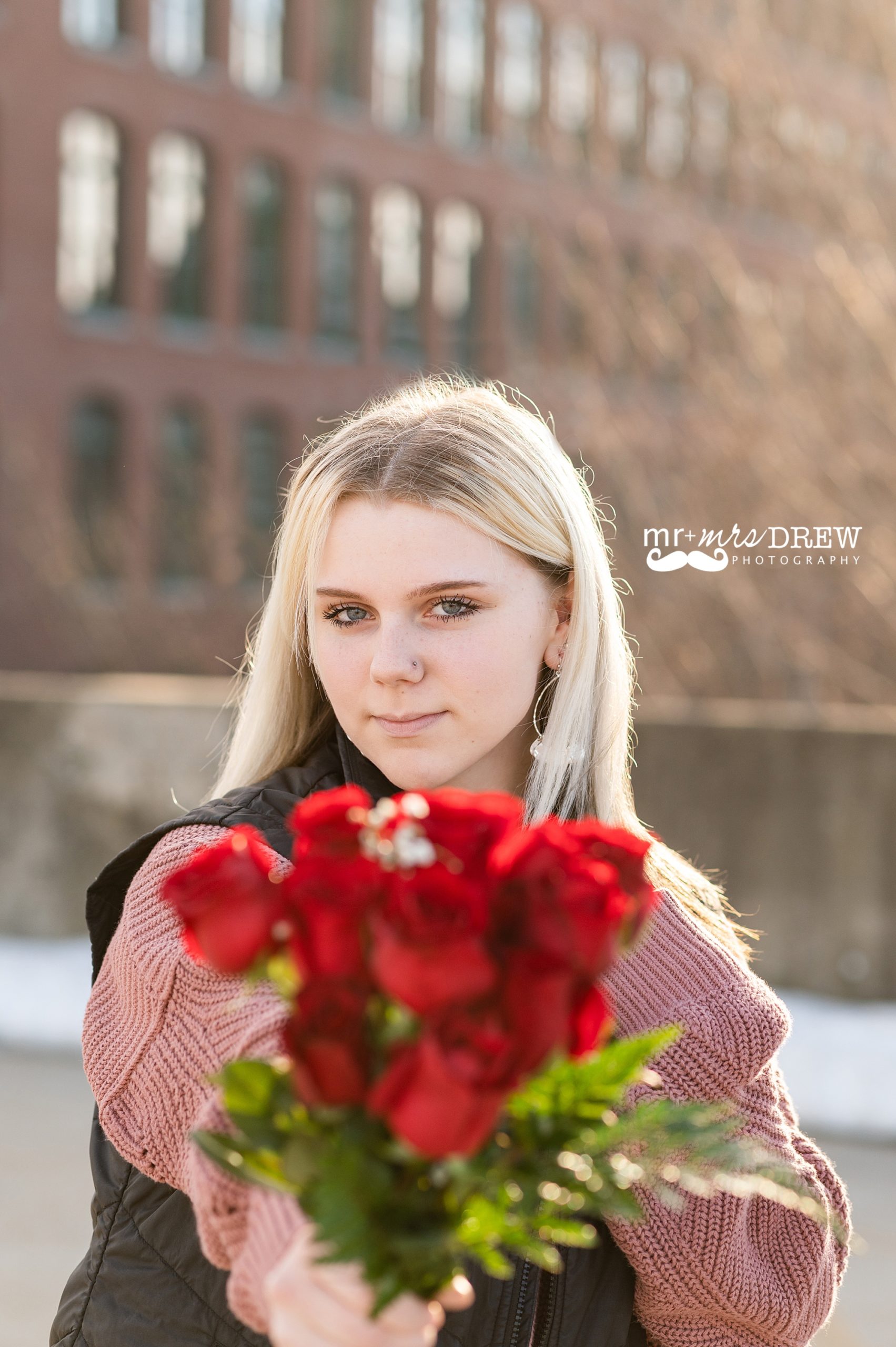 roses as accessory for senior photos in Lowell MA