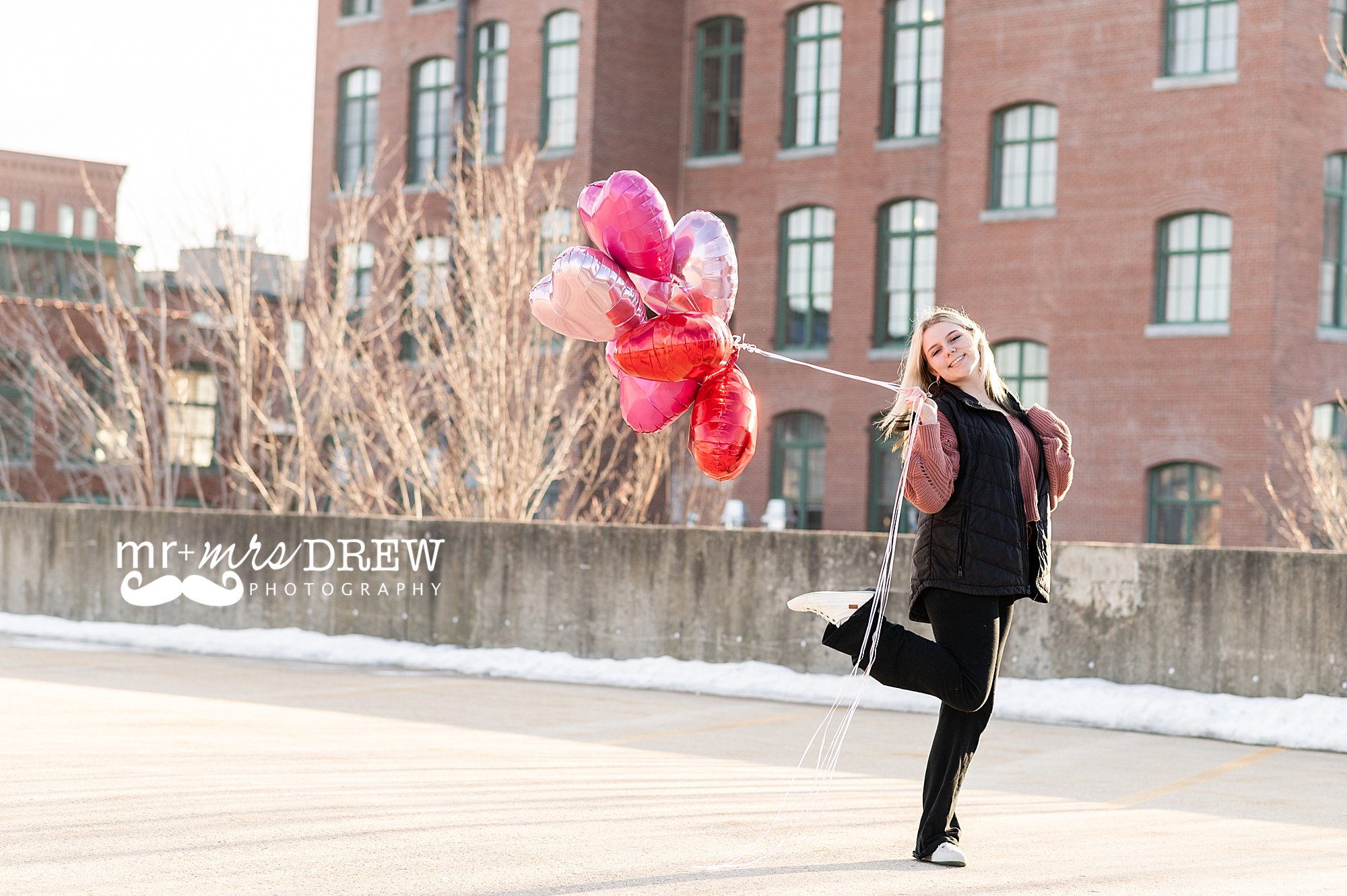 Balloons as an accessory for senior photos in Lowell MA