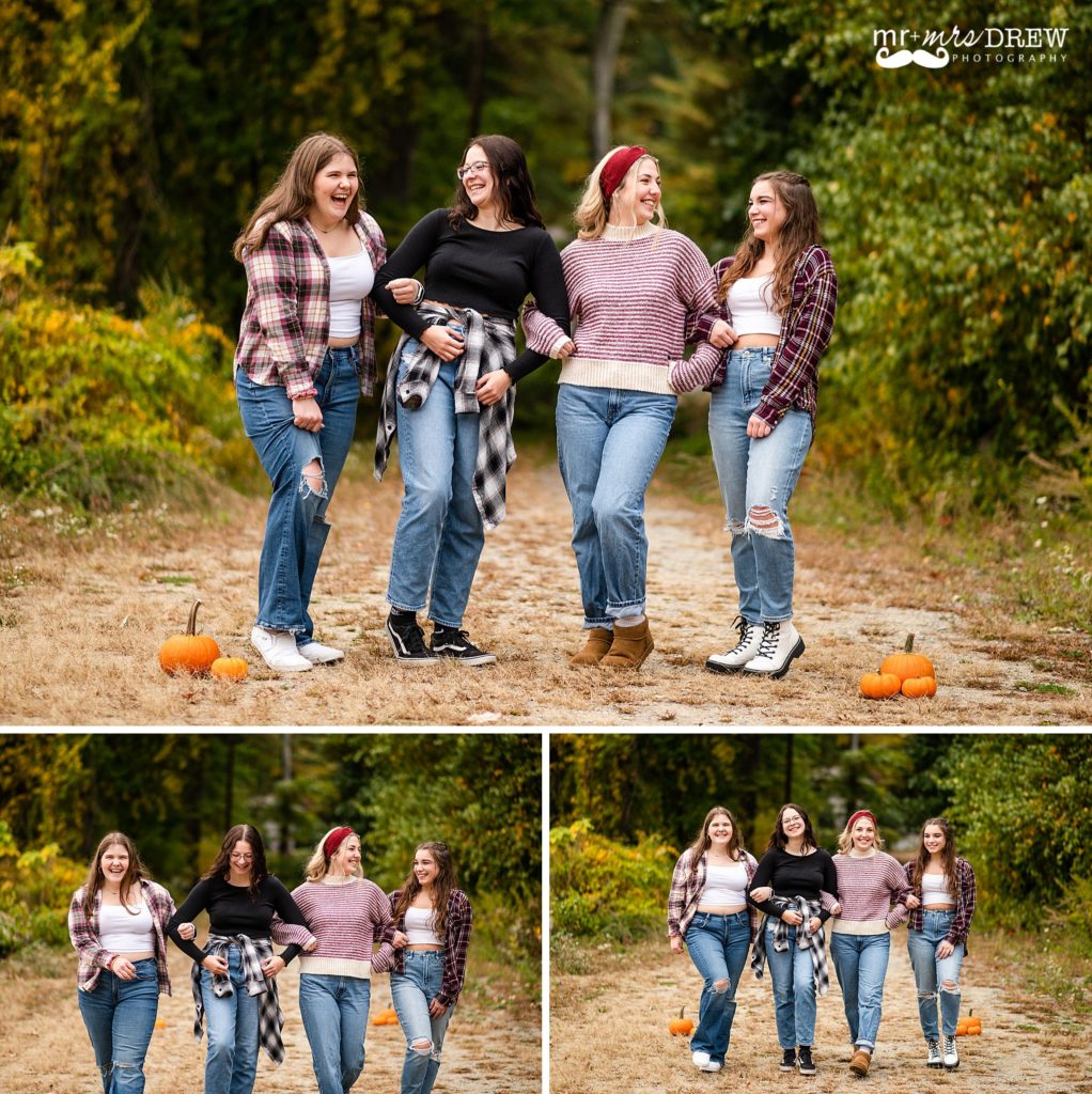 senior girls laughing & walking together wearing flannels and sweaters in Chelmsford, MA