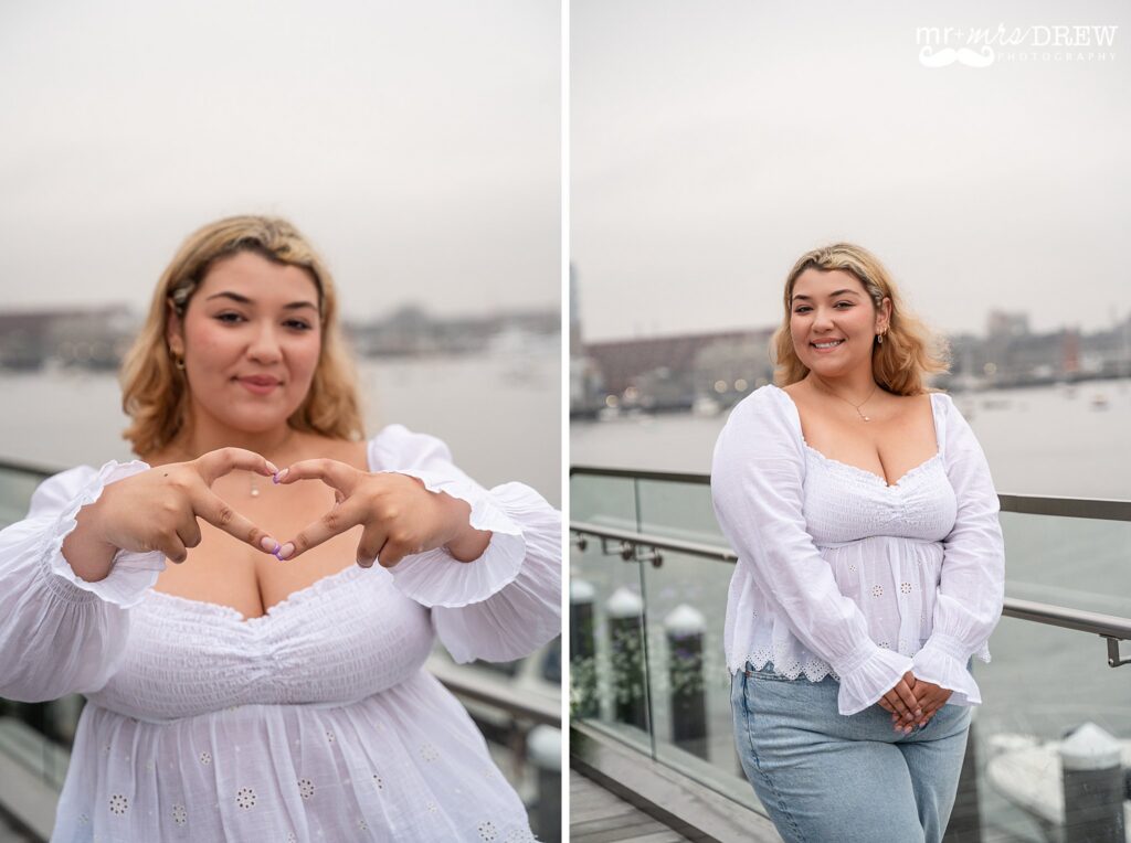 Senior portrait at Fan Pier Park in Boston Seaport with soft waterfront views and natural light.